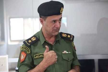 اعتقال المقدم اسامة منصور بسبب انتقاده الرئيس عباس على " فيسبوك " 