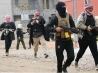 صحيفة بريطانية : 800 مسلح اجبروا 30 الف جندي عراقي بالفرار !!