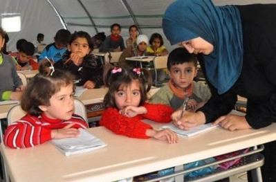 قطر وتركيا توقعان اتفاقية لدعم تعليم اللاجئين السوريين