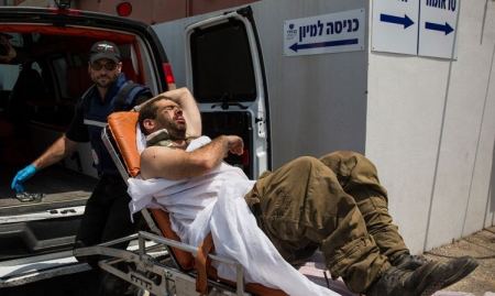 استشهاد فلسطيني وجرح جندي اسرائيلي على حدود غزة
