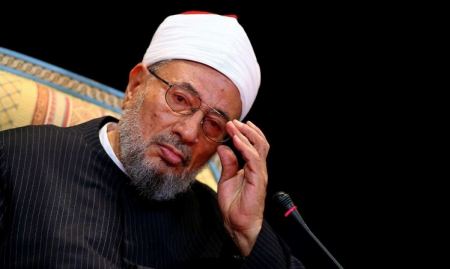 بطلب مصري ... الشيخ القرضاوي مطلوب لـ الانتربول !